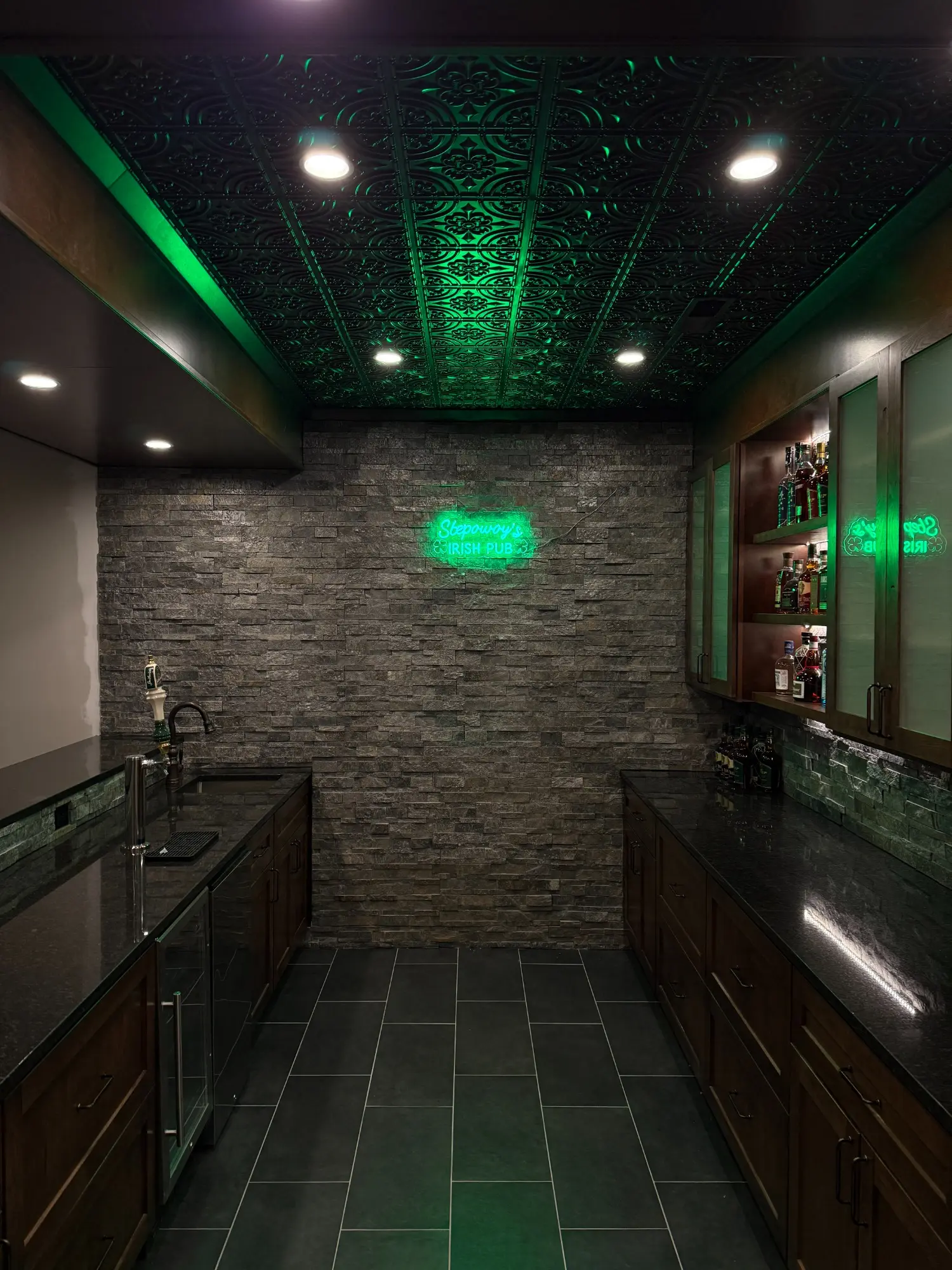 Basement home bar remodeling project by Serge Construction