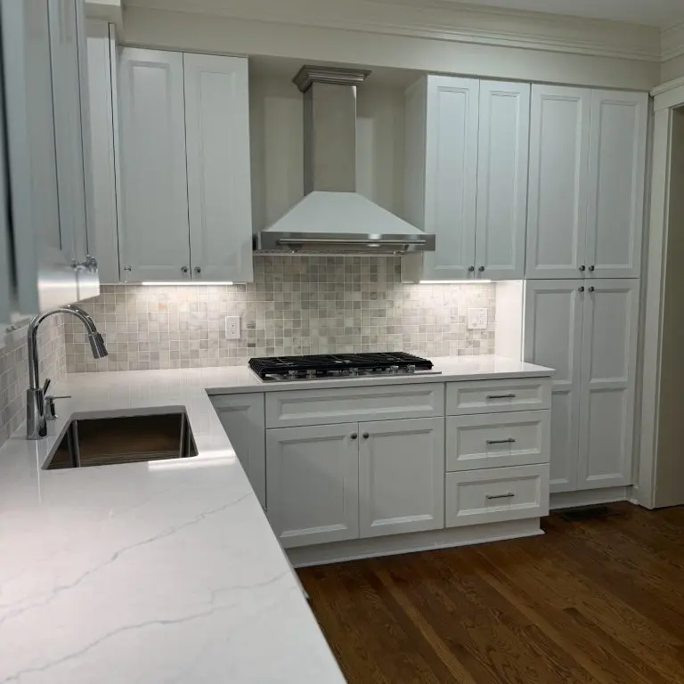 White kitchen remodeling project by Serge Construction